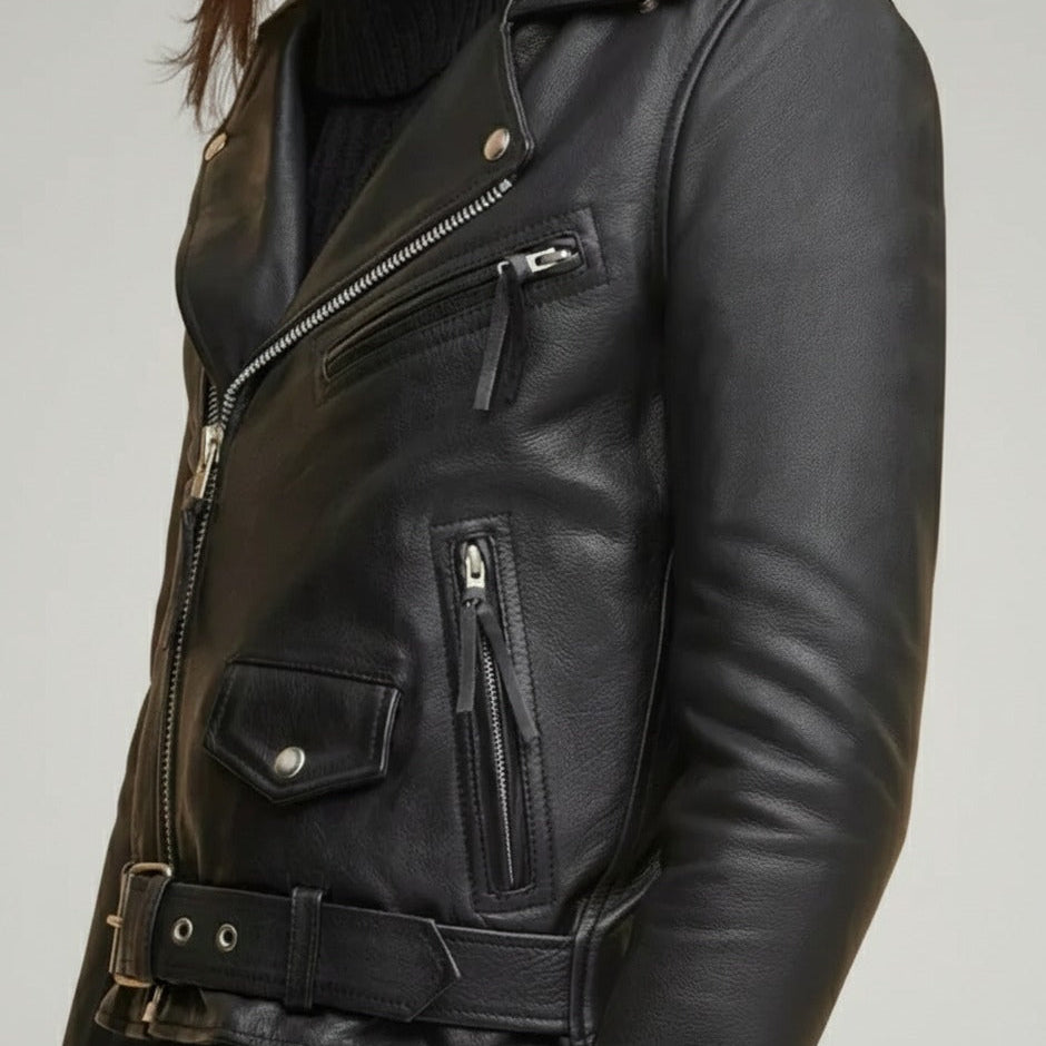 Close‑up of zipper and quilted lining on black women’s biker jacket