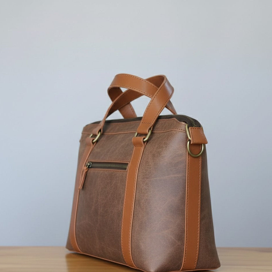 Stylish classic brown handbag displayed