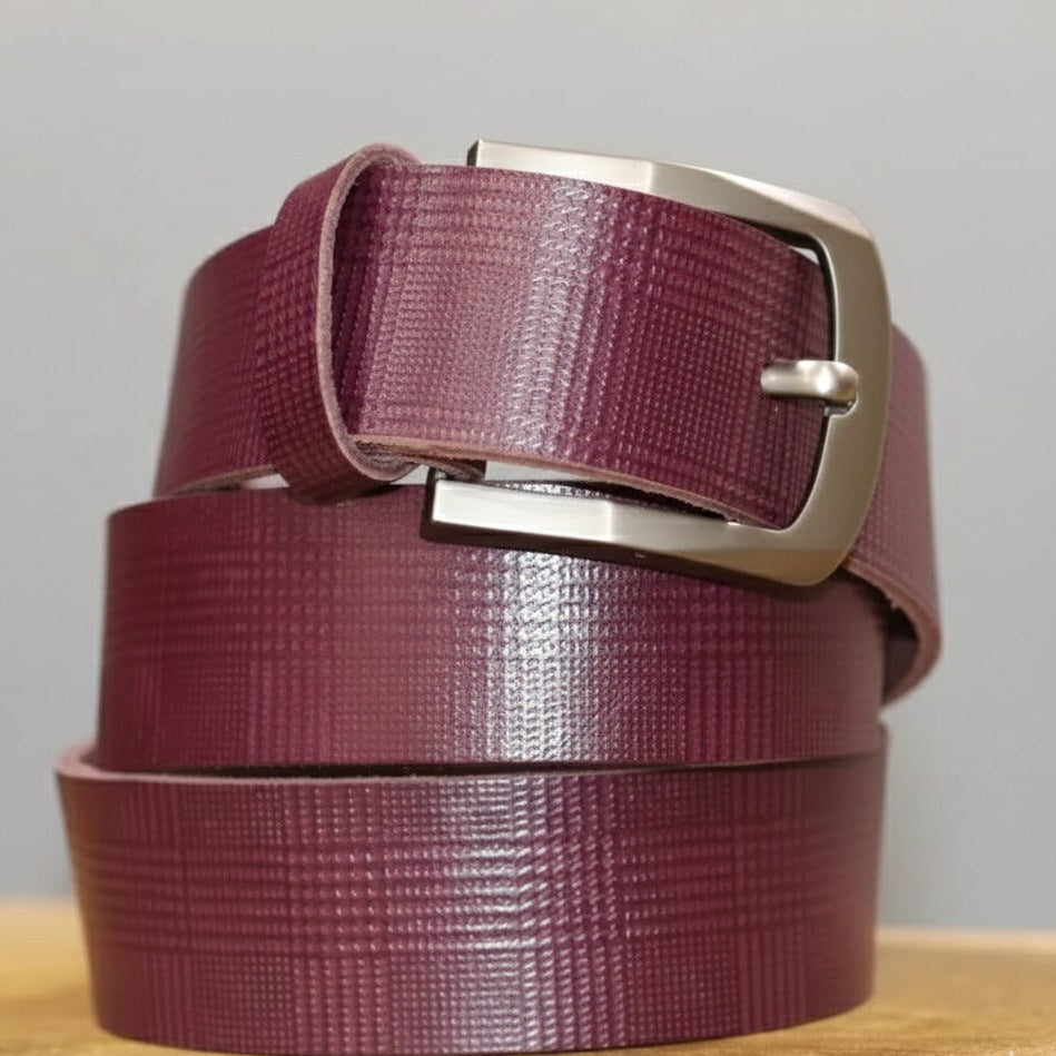 Genuine cow leather texture detail on maroon belt