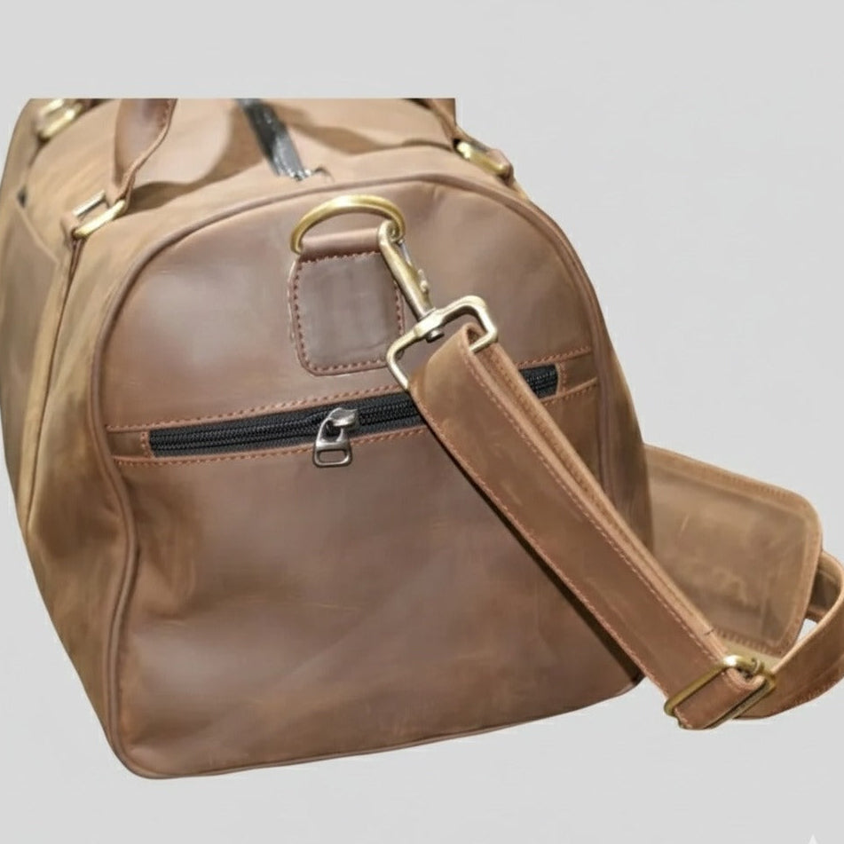 Close‑up of premium leather duffle bag strap and hardware