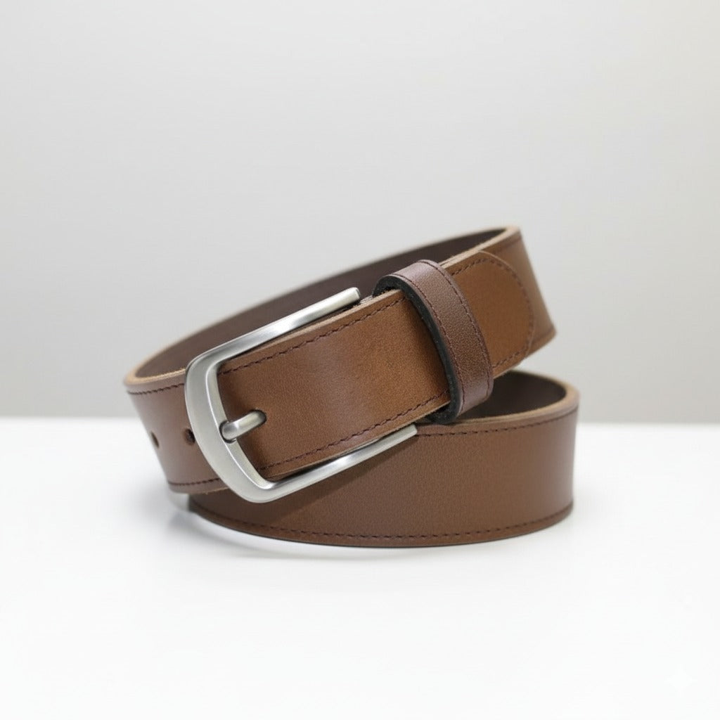 Close‑up of mocha brown leather belt with metal buckle