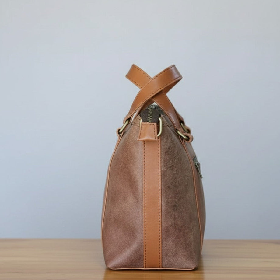 Stylish classic brown handbag displayed